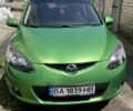 Зелений Мазда 2, об'ємом двигуна 1.5 л та пробігом 200 тис. км за 5500 $, фото 1 на Automoto.ua