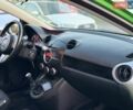 Зеленый Мазда 2, объемом двигателя 1.35 л и пробегом 138 тыс. км за 5500 $, фото 14 на Automoto.ua