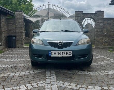 Зеленый Мазда 2, объемом двигателя 1.4 л и пробегом 138 тыс. км за 3800 $, фото 1 на Automoto.ua
