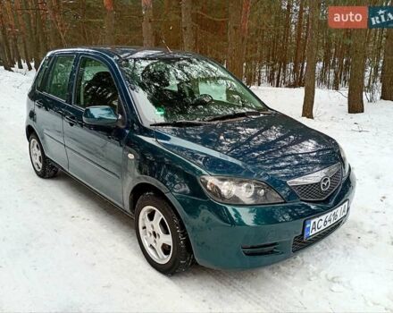 Зелений Мазда 2, об'ємом двигуна 1.39 л та пробігом 188 тис. км за 4500 $, фото 1 на Automoto.ua