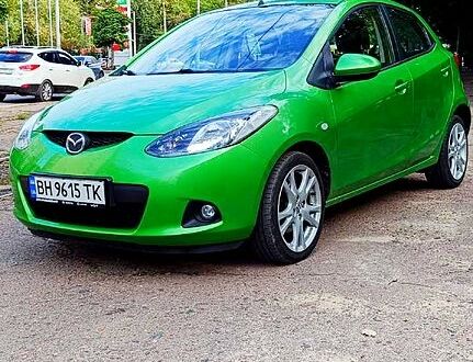Зелений Мазда 2, об'ємом двигуна 1.3 л та пробігом 157 тис. км за 4990 $, фото 1 на Automoto.ua