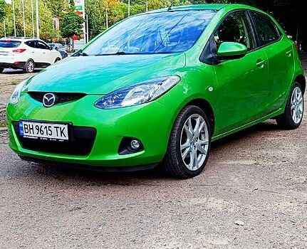 Зеленый Мазда 2, объемом двигателя 1.3 л и пробегом 157 тыс. км за 4990 $, фото 1 на Automoto.ua