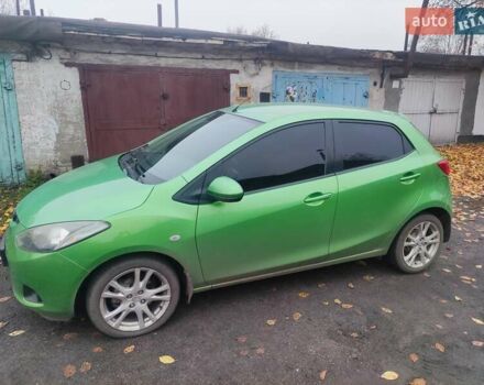 Зеленый Мазда 2, объемом двигателя 1.5 л и пробегом 147 тыс. км за 6000 $, фото 1 на Automoto.ua