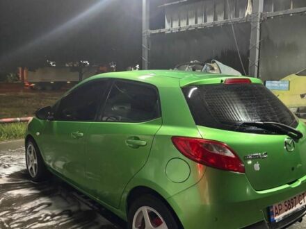 Зелений Мазда 2, об'ємом двигуна 1.5 л та пробігом 136 тис. км за 4200 $, фото 1 на Automoto.ua