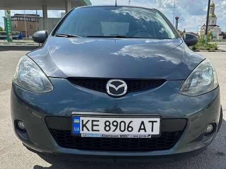 Зеленый Мазда 2, объемом двигателя 1.5 л и пробегом 95 тыс. км за 6800 $, фото 1 на Automoto.ua
