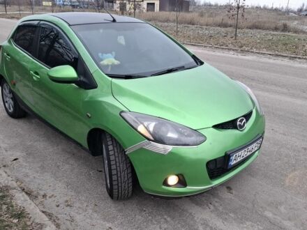 Зеленый Мазда 2, объемом двигателя 1.3 л и пробегом 200 тыс. км за 3997 $, фото 1 на Automoto.ua