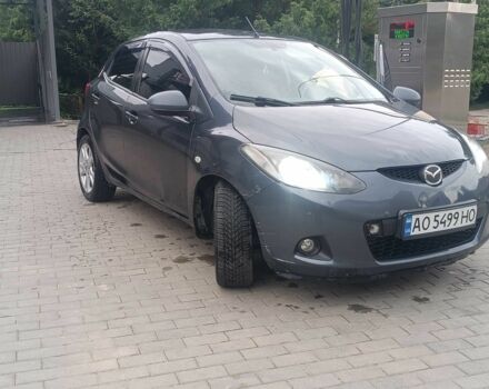 Зелений Мазда 2, об'ємом двигуна 1.5 л та пробігом 117 тис. км за 4600 $, фото 1 на Automoto.ua