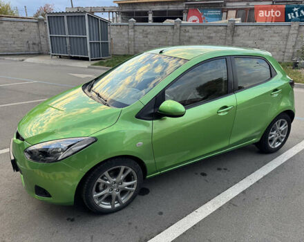Зеленый Мазда 2, объемом двигателя 1.5 л и пробегом 103 тыс. км за 6300 $, фото 1 на Automoto.ua