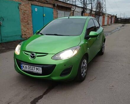 Зеленый Мазда 2, объемом двигателя 1.5 л и пробегом 151 тыс. км за 5700 $, фото 1 на Automoto.ua