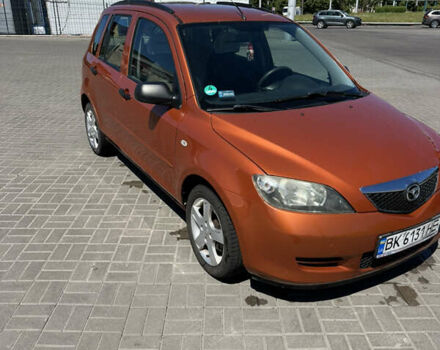 Помаранчевий Мазда 2, об'ємом двигуна 1.4 л та пробігом 222 тис. км за 3500 $, фото 11 на Automoto.ua