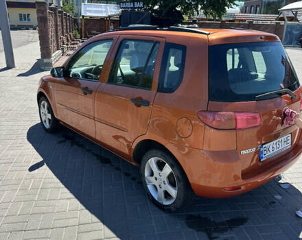 Помаранчевий Мазда 2, об'ємом двигуна 1.4 л та пробігом 222 тис. км за 3500 $, фото 10 на Automoto.ua