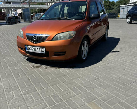 Помаранчевий Мазда 2, об'ємом двигуна 1.4 л та пробігом 222 тис. км за 3500 $, фото 6 на Automoto.ua