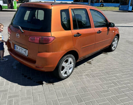 Помаранчевий Мазда 2, об'ємом двигуна 1.4 л та пробігом 222 тис. км за 3500 $, фото 12 на Automoto.ua