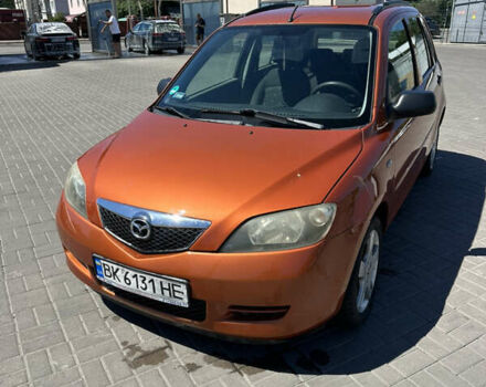 Помаранчевий Мазда 2, об'ємом двигуна 1.4 л та пробігом 222 тис. км за 3500 $, фото 7 на Automoto.ua