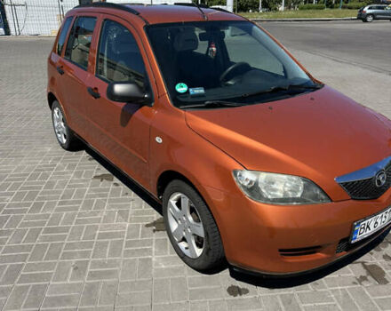 Помаранчевий Мазда 2, об'ємом двигуна 1.4 л та пробігом 222 тис. км за 3500 $, фото 14 на Automoto.ua