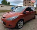 Оранжевый Мазда 2, объемом двигателя 1.5 л и пробегом 270 тыс. км за 5750 $, фото 1 на Automoto.ua