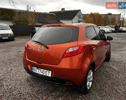 Оранжевый Мазда 2, объемом двигателя 1.5 л и пробегом 268 тыс. км за 6350 $, фото 5 на Automoto.ua