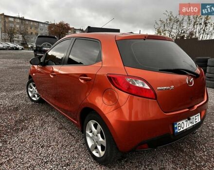 Оранжевый Мазда 2, объемом двигателя 1.5 л и пробегом 268 тыс. км за 6350 $, фото 4 на Automoto.ua
