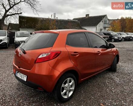 Оранжевый Мазда 2, объемом двигателя 1.5 л и пробегом 268 тыс. км за 6350 $, фото 3 на Automoto.ua