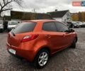 Оранжевый Мазда 2, объемом двигателя 1.5 л и пробегом 268 тыс. км за 6350 $, фото 3 на Automoto.ua