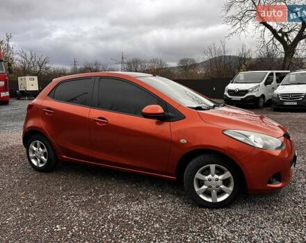 Оранжевый Мазда 2, объемом двигателя 1.5 л и пробегом 268 тыс. км за 6350 $, фото 1 на Automoto.ua