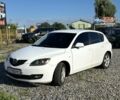 Білий Мазда 3, об'ємом двигуна 1.6 л та пробігом 303 тис. км за 2750 $, фото 1 на Automoto.ua