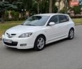 Белый Мазда 3, объемом двигателя 2 л и пробегом 247 тыс. км за 5700 $, фото 1 на Automoto.ua