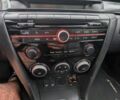 Белый Мазда 3, объемом двигателя 2 л и пробегом 247 тыс. км за 5700 $, фото 12 на Automoto.ua