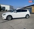 Белый Мазда 3, объемом двигателя 1.6 л и пробегом 240 тыс. км за 5499 $, фото 1 на Automoto.ua