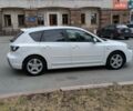 Белый Мазда 3, объемом двигателя 2 л и пробегом 247 тыс. км за 5700 $, фото 4 на Automoto.ua