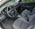 Білий Мазда 3, об'ємом двигуна 2 л та пробігом 230 тис. км за 5654 $, фото 2 на Automoto.ua