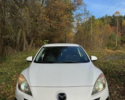 Белый Мазда 3, объемом двигателя 1.56 л и пробегом 230 тыс. км за 6800 $, фото 1 на Automoto.ua