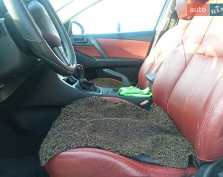 Белый Мазда 3, объемом двигателя 1.56 л и пробегом 230 тыс. км за 6500 $, фото 16 на Automoto.ua