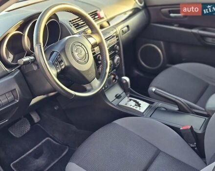 Білий Мазда 3, об'ємом двигуна 1.6 л та пробігом 152 тис. км за 5700 $, фото 13 на Automoto.ua