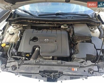 Білий Мазда 3, об'ємом двигуна 1.6 л та пробігом 230 тис. км за 5500 $, фото 6 на Automoto.ua