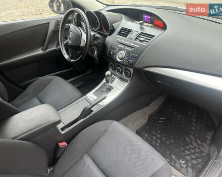 Белый Мазда 3, объемом двигателя 1.6 л и пробегом 130 тыс. км за 7200 $, фото 9 на Automoto.ua