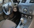 Белый Мазда 3, объемом двигателя 2 л и пробегом 200 тыс. км за 8500 $, фото 39 на Automoto.ua