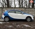 Білий Мазда 3, об'ємом двигуна 1.6 л та пробігом 151 тис. км за 6850 $, фото 14 на Automoto.ua