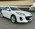Белый Мазда 3, объемом двигателя 2 л и пробегом 134 тыс. км за 10200 $, фото 1 на Automoto.ua