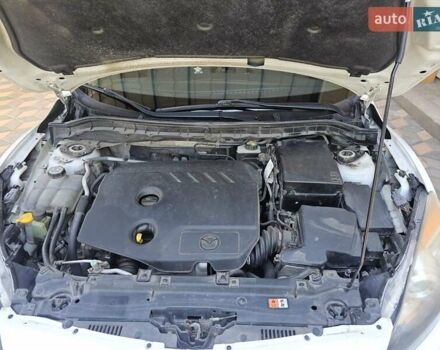 Білий Мазда 3, об'ємом двигуна 1.56 л та пробігом 227 тис. км за 7900 $, фото 4 на Automoto.ua
