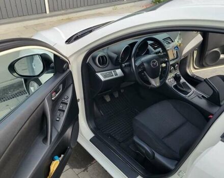 Білий Мазда 3, об'ємом двигуна 1.56 л та пробігом 228 тис. км за 7700 $, фото 11 на Automoto.ua