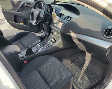 Білий Мазда 3, об'ємом двигуна 1.56 л та пробігом 228 тис. км за 7700 $, фото 17 на Automoto.ua