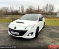 Белый Мазда 3, объемом двигателя 2.3 л и пробегом 150 тыс. км за 9000 $, фото 1 на Automoto.ua