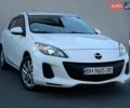 Белый Мазда 3, объемом двигателя 2 л и пробегом 208 тыс. км за 6990 $, фото 1 на Automoto.ua