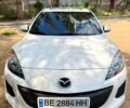 Белый Мазда 3, объемом двигателя 2 л и пробегом 170 тыс. км за 8500 $, фото 1 на Automoto.ua