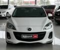 Белый Мазда 3, объемом двигателя 2 л и пробегом 85 тыс. км за 10490 $, фото 1 на Automoto.ua