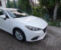 Белый Мазда 3, объемом двигателя 2 л и пробегом 169 тыс. км за 9400 $, фото 1 на Automoto.ua