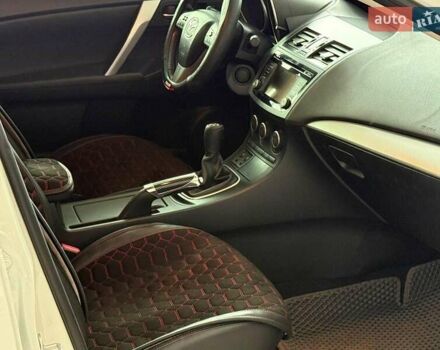 Белый Мазда 3, объемом двигателя 2 л и пробегом 85 тыс. км за 10490 $, фото 22 на Automoto.ua