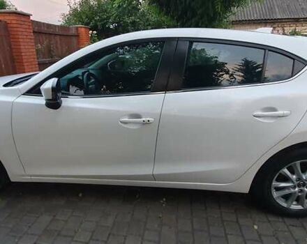 Белый Мазда 3, объемом двигателя 2 л и пробегом 169 тыс. км за 9400 $, фото 3 на Automoto.ua