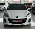Белый Мазда 3, объемом двигателя 2 л и пробегом 85 тыс. км за 10490 $, фото 1 на Automoto.ua